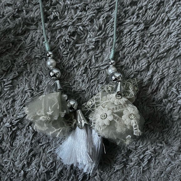 Turquoise Net Embroidered Lehenga Choli - Picture 8 of 9